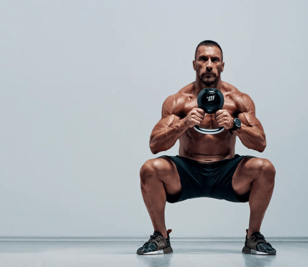 Men exercises at GYM